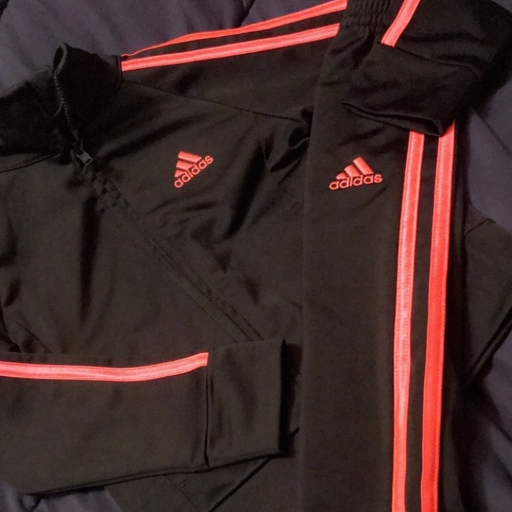 Matching jacket and pants. Never worn. New without tags
